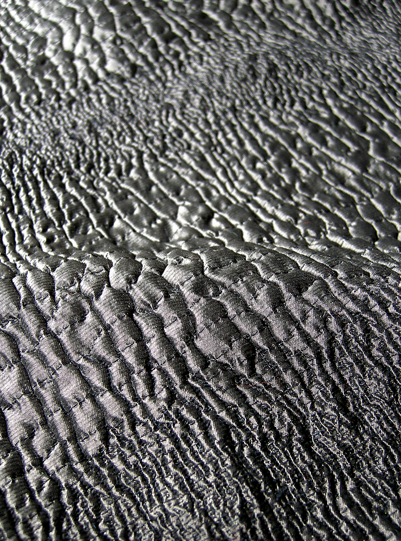 woven, 3-dimensional fabric for ties, like a crododile